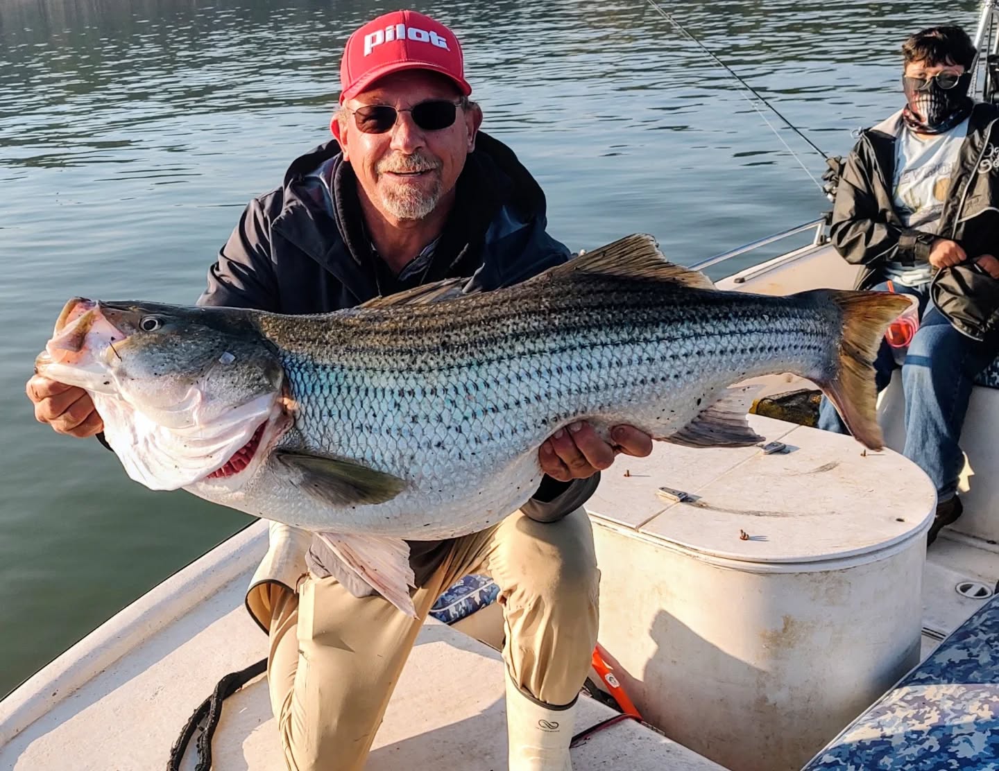 HOLY LAKE ALLATOONA! CONGRATULATIONS DOMINGO!  He caught it and let me hold it for a picture. They're out there everybody. Still have some openings this week and next weekend if anybody's interested. 770-815-9579